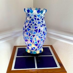 Beautiful blue glass decorative lamp. Perfect for bedside or accent lighting.